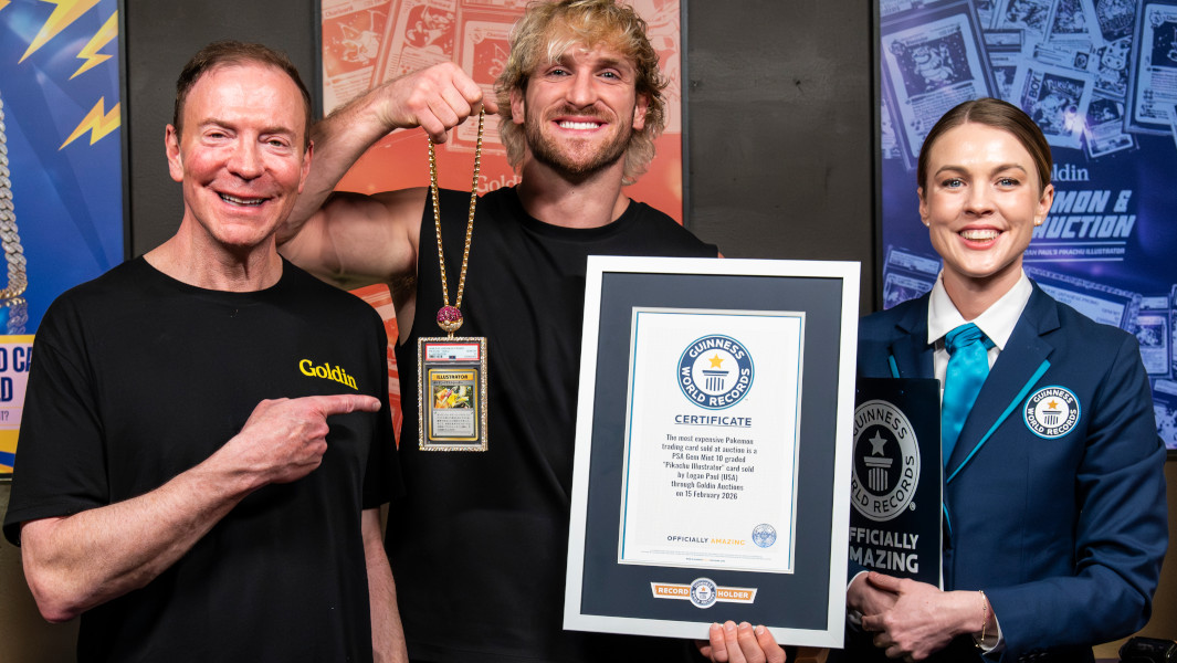 Logan Paul with the Pikachu Illustrator card